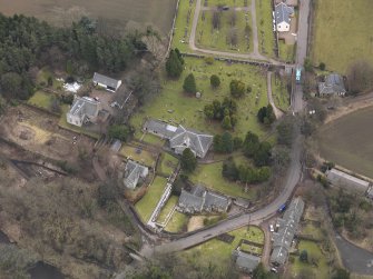 Oblique aerial view centred on the kirk, taken from the NNW.