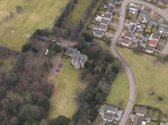 Oblique aerial view centred on the country house, taken from the ESE.