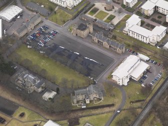 Oblique aerial view centred on the barracks, taken from the ENE.