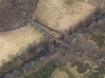 Oblique aerial view centred on the railway viaduct, taken from the ESE.