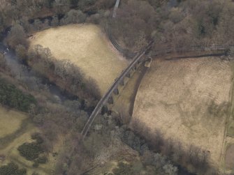 Oblique aerial view centred on the railway viaduct, taken from the NE.