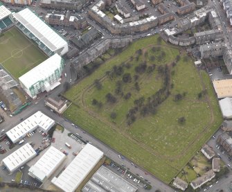 Oblique aerial view centred on the cemetery, taken from the NW.