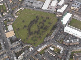 Oblique aerial view centred on the cemetery, taken from the SSW.