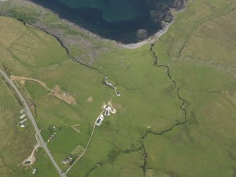 Oblique aerial view of Port Earlish and the remains of the field system and farmstead, taken from the SW.