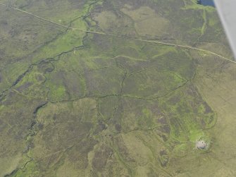 General oblique aerial view of Dun Borrafiach broch, buildings and field system, taken from the E.