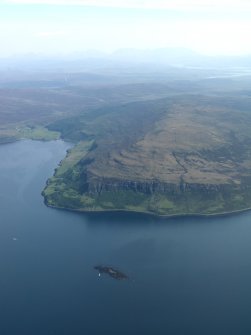 General oblique aerial view of Loch Bay and Sgurr a' Bhagh, taken from the NW.