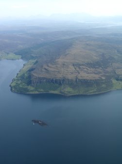 General oblique aerial view of Loch Bay and Sgurr a' Bhagh, taken from the NW.