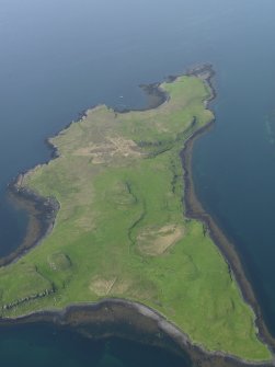 General oblique aerial view of the remains of the township buildings on Iosaigh, taken from the SSE.