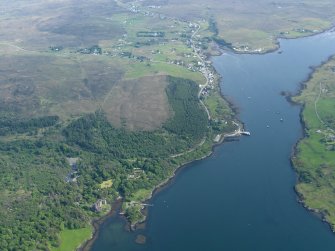 General oblique aerial view of Dunvegan castle and policies with Dunvegan beyond, taken from the N.
