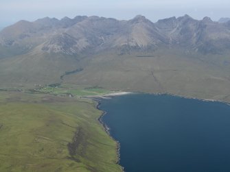 General oblique aerial view of Glenbrittle with the Cuillin Hills beyond, taken from the WSW.