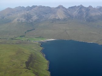 General oblique aerial view of Glenbrittle with the Cuillin Hills beyond, taken from the WSW.
