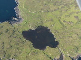 Oblique aerial view centred on the harbour at Loch na h-Airde, the 'Viking Canal’ and Rubh' an Dunain, taken from the S.