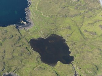 Oblique aerial view centred on Loch na h-Airde, the 'Viking Canal’ and Rubh' an Dunain, taken from the SSW.