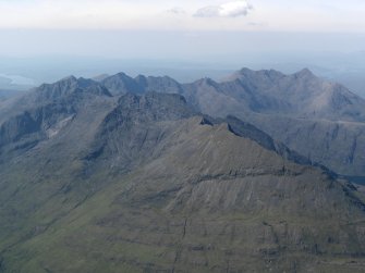 General oblique aerial view of the Cuillin Hills with Gars-bheinn in the foreground, taken from the SSE.