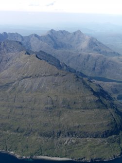 General oblique aerial view of the Cuillin Hills with Gars-bheinn in the foreground, taken from the SSE.