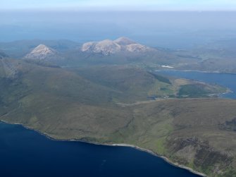 General oblique aerial view looking over Glen Scaladal with Beinn na Caillich and Torrin beyond, taken from the WSW.