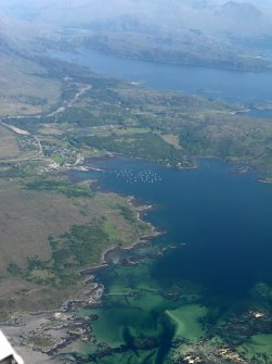 General oblique aerial view looking along Loch nan Ceall towards Arisaig with the A830 improvements roadworks visible, taken from the W.