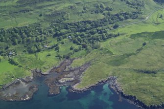 Oblique aerial view centred on the remains of the broch of Dun nan Gall, taken from the W.