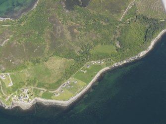 General oblique aerial view of Ardnaneaskan village and the fish trap, taken from the SW.