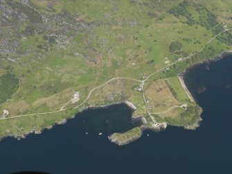 Oblique aerial view centred on the remains of Strome Castle, taken from the S.