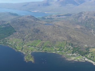 General oblique aerial view looking across Lochcarron village, taken from the E.
