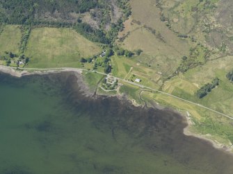 Oblique aerial view centred on Kirkton centred onthe church, taken from the E.