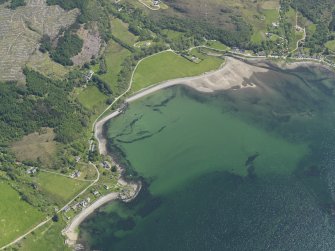 Oblique aerial view of Ardarroch and Ardoch centred on the fish traps in the bay, taken from the WNW.