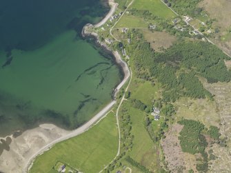 Oblique aerial view of Ardoch and Ardarroch centred on the fish traps in the bay, taken from the SE.