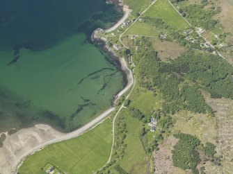 Oblique aerial view of Ardoch and Ardarroch centred on the fish traps in the bay, taken from the SE.