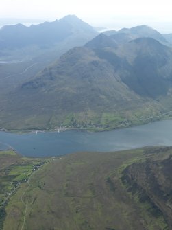 General oblique aerial view looking S across the mouth of Loch Sligachan to Glamaig.