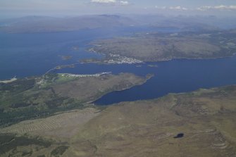 General oblique aerial view of the Skye Bridge with Kyleakin in the foreground and Kyle of Lochalsh in the distance, taken from the S.