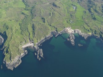 Oblique aerial view of Ockle point with Swordle Farm in the distance, taken from the NW.