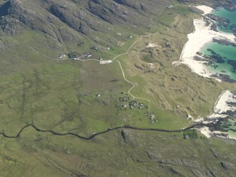 General oblique aerial view of Sanna township, taken from the N.