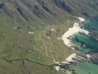 General oblique aerial view of Sanna township, taken from the NNW.