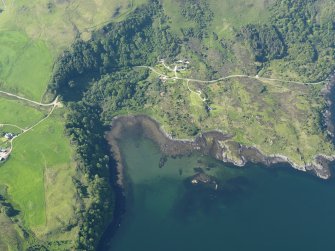 Oblique aerial view centred on the remains of the possible fish trap at Camas Ban, taken from the SSE.