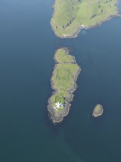 General oblique aerial view of Eilean Musdile and the Lismore lighthouse, taken from the SW.