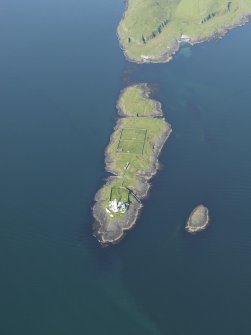 General oblique aerial view of Eilean Musdile and the Lismore lighthouse, taken from the SSW.