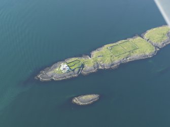 General oblique aerial view of Eilean Musdile and the Lismore lighthouse, taken from the SSE.
