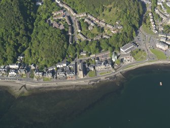 Oblique aerial view centred on St Columba's Roman Catholic cathedral, Oban, taken from the SW.