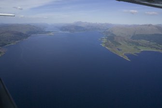 General oblique aerial view looking up Loch Linnhe towards Corran Ferry with Loch Leven to the right, taken from the SW.