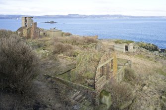 View from S shoing collapsed huts with No.2 gun emplacement and Battery Observation Tower.