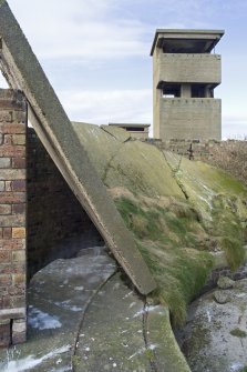 Detail of collapsed canopy with the Battery Observation Post in the background.