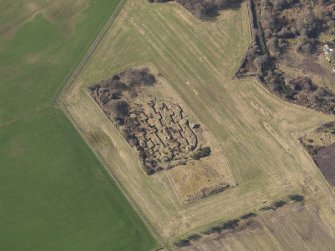 Oblique aerial view centred on a trench system in the Ordnance Factory, taken from the N.