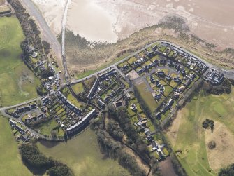 Oblique aerial view centred the village, taken from the NW.