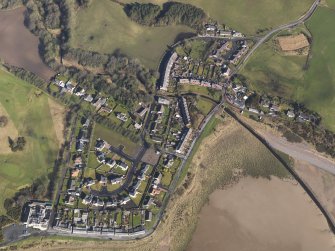 Oblique aerial view centred the village, taken from the S.