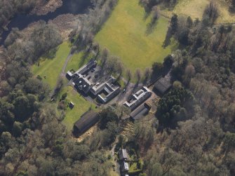 Oblique aerial view centred on the stables, taken from the WNW.