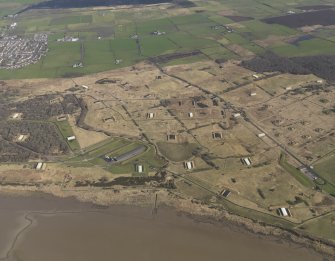 Oblique aerial view centred on part of the explosives works, taken from the SSW.