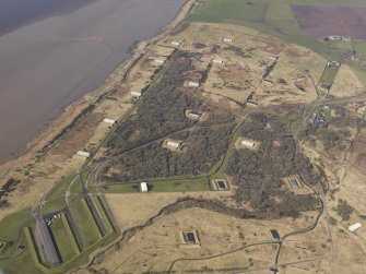 Oblique aerial view centred on part of the explosives factory, taken from the NE.