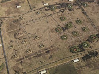 Oblique aerial view centred on part of the explosives factory, taken from the SE.