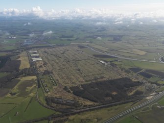 General oblique aerial view centred on the explosives stores, taken from the SW.